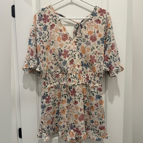 Size medium Sadie and Sage cream with flowers romper. - Picture 2 of 2